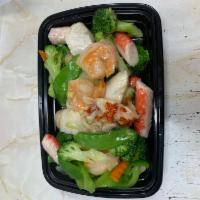 C25. Seafood Delight · Shelled lobster meat, sea scallops and jumbo shrimp sauteed with many kinds of fresh vegetab...