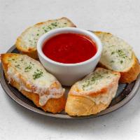 Garlic chesse bread · 4 slices of garlic bread topped with melted mozzarella 