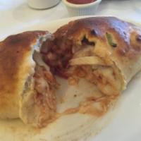 BBQ Chicken Calzone · Chicken with BBQ sauce, onions, bell peppers and mozzarella cheese.