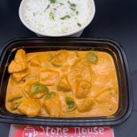 Chicken Tikka Masala Curry · Grilled chicken in onion, Tomato, Cashew nut sauce with a  lite touch of a cream.