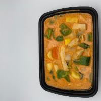 Thai Red Curry chicken · Chicken and seasonal veggies  simmered in Thai red curry coconut sauce. 