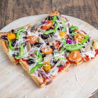 Veggies Pizza · Mushrooms, onions, green and red peppers, black olives and tomatoes.