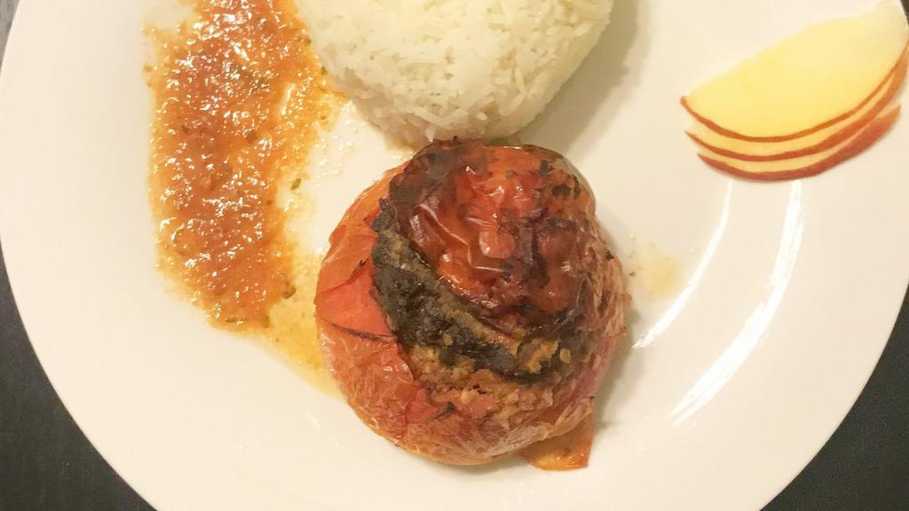 Tomates Farcies  · Tomatoes stuffed with marinated and seasoned ground beef served with rice