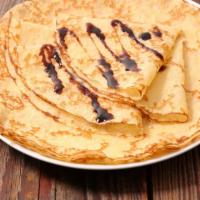 Crêpe Maison ·  Delicious homemade crepes served with powder sugar or Caramel or Nutella 