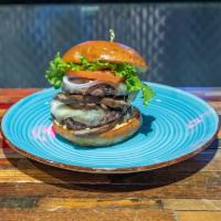 Shroom Burger · Black Angus Beef topped with a grilled Portobello Mushroom cap, Swiss Cheese, White Truffle ...