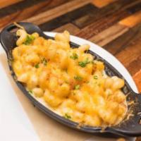 Mac & Cheese · Made with a Cheddar Cheese Blend and topped with Bread Crumbs.