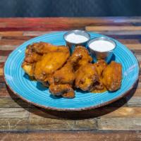 Chicken Wings · 1lb Chicken Wings Deep Fried and Made with Your Choice of Sauce.