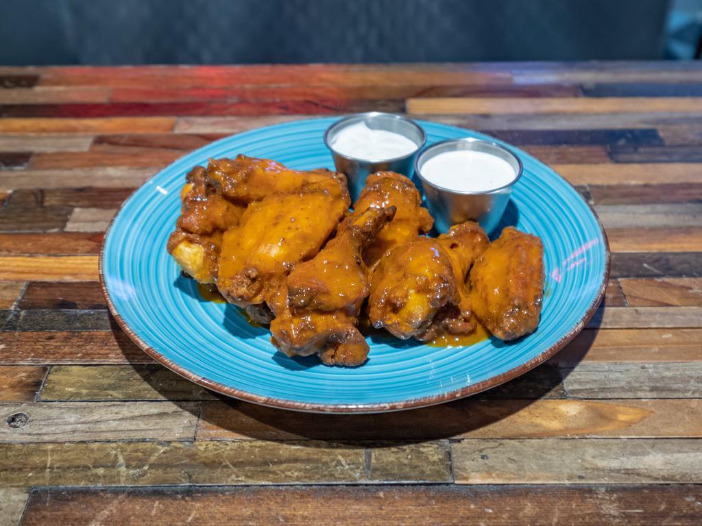 Chicken Wings · 1lb Chicken Wings Deep Fried and Made with Your Choice of Sauce.