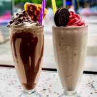 Classic Milkshakes · Choose from Vanilla, Chocolate, Banana, or Strawberry.