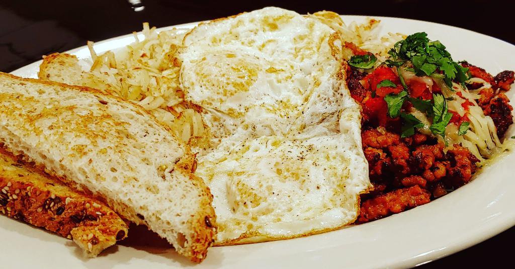 Hearty Hash Bowl · Pork sausage, hash, salsa, eggs, and pepper jack cheese.