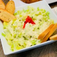 La Caesar Salad plus a Drink · Hearts of romaine lettuce, house croutons and shaved Parmesan, tossed in roasted garlic Caes...