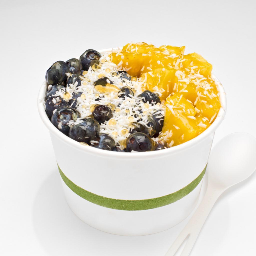 #3. ACAI BOWL · Coconut milk, frozen strawberry, acai, dates.
Topped with pineapple, blueberry, coconut flakes, honey drizzle