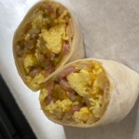 Breakfast Burrito · Flour tortilla, potatoes, eggs, cheddar cheese, served with choice of bacon, ham or sausage,...