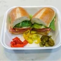 Spicy Italian Sandwich Lunch · Salami, pepperoni and mozzarella cheese, with pepperoncini and fire-roasted tomatoes, on whi...