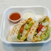Chicken Wrap or Crunch Wrap  · Chicken, Cheddar cheese, fresh greens, tomatoes, and choice of Buffalo or ranch sauce wrappe...