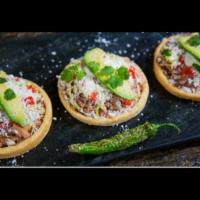 Mexican Sopes Plate(2) · Protein: Your choice of seasoned steak, alpastor or chicken over a homemade corn flour shell...