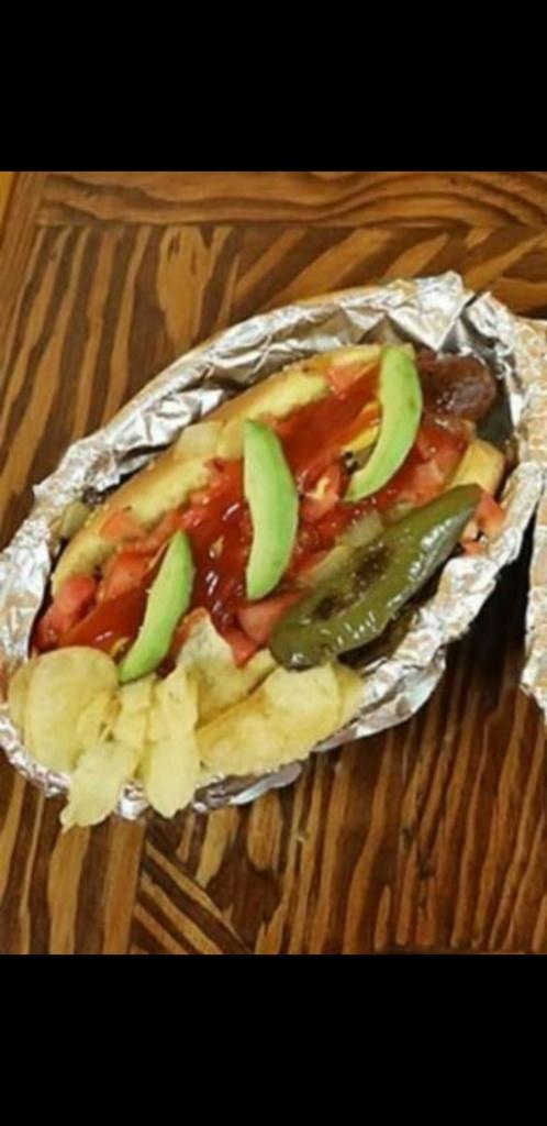 La Street Dog · Protein: Pork sausage wrapped in bacon. Toppings: Grilled onions and avocado, dressed in ketchup, mayonnaise and mustard. Side: Baked potato chips.