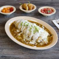 Wet Style Chile Verde Burrito · Juicy lean chunks of pork simmered in a rich tomatillo sauce, beans, rice, salsa, onions, ci...