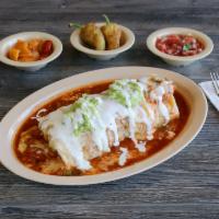 Wet Style Chile Colorado Burrito · Shredded beef simmered in ranchera sauce, beans, rice, salsa, onions, cilantro.
Topped with ...