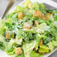 Caesar Salad · Crispy romaine lettuce, croutons & Parmesan cheese with our creamy Caesar dressing.