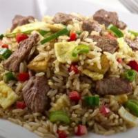 Arroz Chaufa de Carne (Skirt steak fried rice) · skirt steak fried rice. Jasmine rice, eggs, scallions, red and green peppers, soy sauce & se...