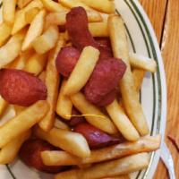 Salchipapas  · Hot dogs, french fries & Salad.