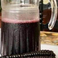 Chicha Morada · Purple corn & fruits drink. 16 oz.