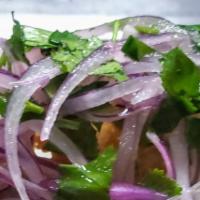 Salsa Criolla · Red Onions & Cilantro tossed with lime.