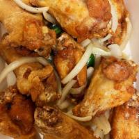 A8. Chicken Wings · Salt and peppered or Asian style.
 (8 pieces)