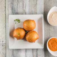 Mysore Bonda · Popular south Indian style savoury beignet made with flour and yogurt. Crispy outside and so...