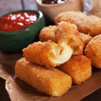 Mozzarella Sticks · Tossed in 5 months aged Parmesan cheese served with homemade marinara sauce.