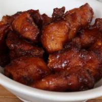 Honey Chipotle Wings · 6 pieces tossed in homemade honey chipotle sauce, gluten free. Choice of homemade ranch or h...