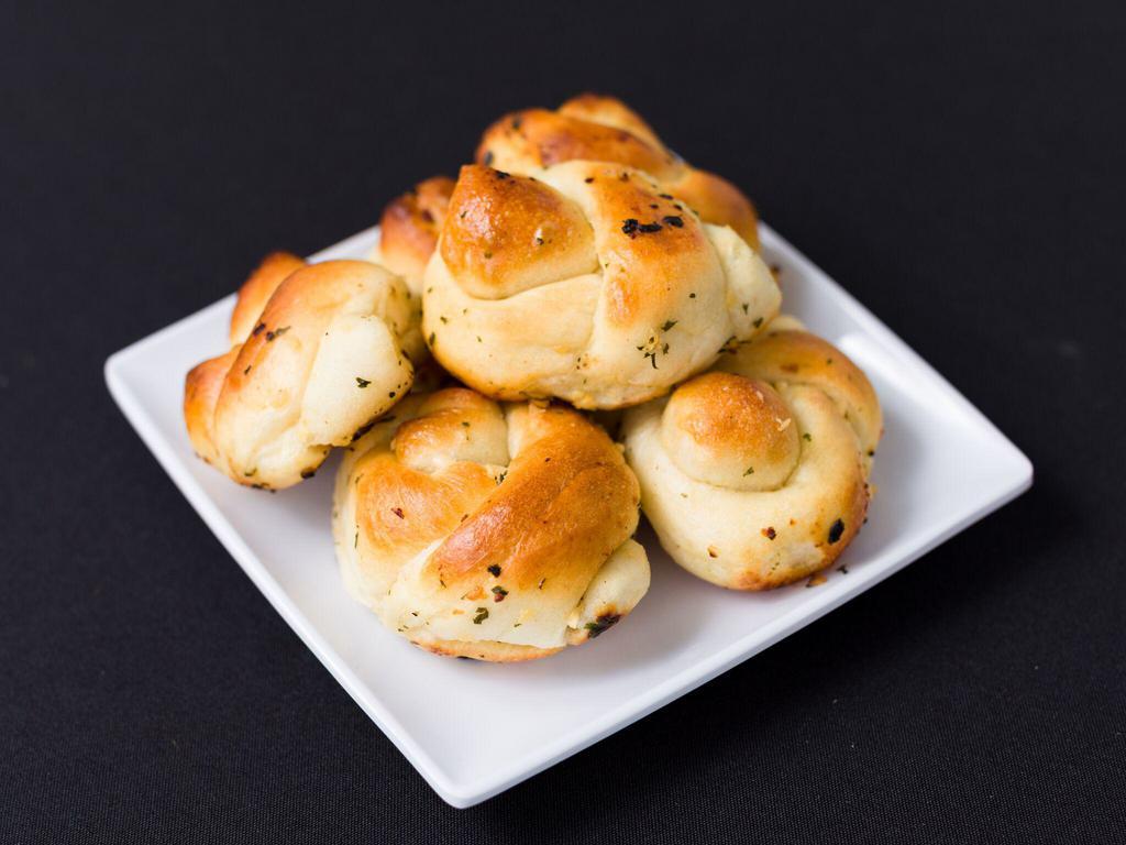 Garlic Knots · 6 pieces, sauce not included.