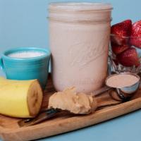 PB and J Shake · Peanut butter, strawberries, banana, almond milk and chocolate whey.