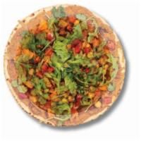 Masala · chickpea spread topped w/ roasted onions, carrots, peas, roasted tomatoes, cilantro, chickpe...