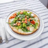 Capri Sicilian Pizza · White pizza. Spinach, broccoli and tomatoes.