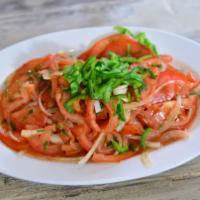 Achichuk Salad · Tomato, onion, and jalapenos.