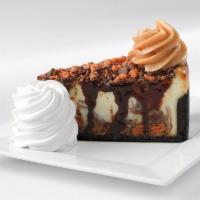 Caramel Peanut Butter Cake · A heavenly combination of peanut butter mousse, chopped snickers, caramel, peanuts, milk, an...