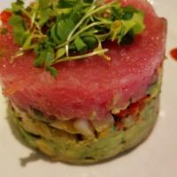 Tuna Tartar · Served with avocado and quail egg.