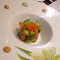 Salmon Tartar · Served with avocado and quail egg.