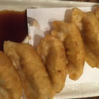 Gyoza · Pan-fried dumplings.