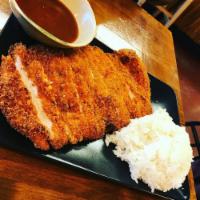 66. Chicken Katsu · Served with rice and miso soup or green salad, deep fried with katsu sauce.
