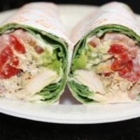 4.California Wrap · Grilled chicken, ranch dressing, lettuce, tomato, avocado and red roasted peppers. 
