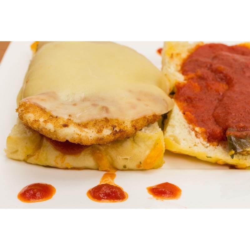 Chickenless Parmesan Hero - VEGAN · Grilled chickenless cutlet in italian marinara sauce and smothered with melted mozzarella cheese. 
