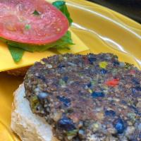 Black Bean and Poblano Burger · A 1/4 pound patty made of black beans, poblano peppers, roasted corn and red peppers. Grille...