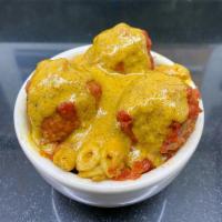 Meatless Balls and Mac and Cheese Bowl · Mac and cheese topped with meatless balls and Italian marinara sauce. 