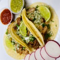 Mexican Taco · Cilantro and onion mix, salsa verde, sliced radish and lime. 
