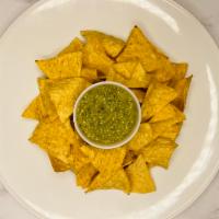 Chips and Guacamole · Fresh tortilla chips with a side of homemade guacamole.