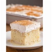 Tres Leches Cake · Ultra light sponge cake soaked in a sweet milk mixture.