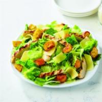 Regular Chicken Caesar Salad · Fresh-cut lettuce, grilled chicken, parmesan cheese and croutons made daily.